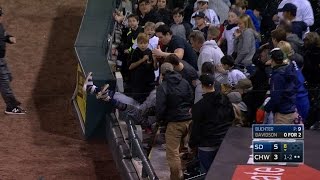 Solarte jumps into the stands for the catch