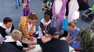 Trick-or-Treaters Learn CPR