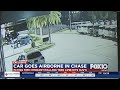 Car goes airborne during police chase