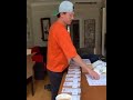 Tom packing THEBROTHERSTRUST mugs!!