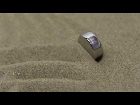 Button cell battery in a SandScript Button cell battery in a SandScript