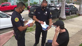 Miami officers begin handing out citations to those not wearing masks