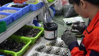 The production line is assembling electric actuators and valve accessories