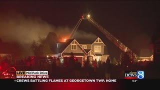 Georgetown Twp. firefighters battle house fire