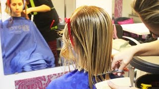 A kind student getting a renewed classic bob haircut