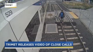 Close calls with TriMet MAX trains caught on camera: 'Be aware of your surroundings'