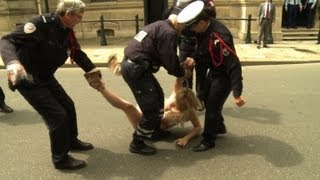 Topless Femen activists arrested in Paris