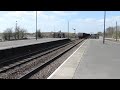 db class 66015 with a rake of loaded iron ore wagons