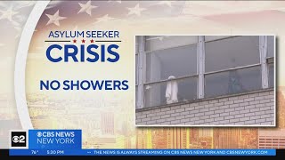 Temporary shelter for asylum seekers has no showers