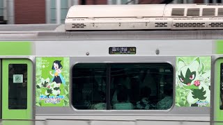 山手線E235系ﾄｳ31編成（ニャローテラッピング）が東京駅を発車しているシーン