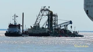 tugs ISA PISA and GRUNO III PH3542 towing offshore dredger BODO CONNECTOR DHJB2 in Emden