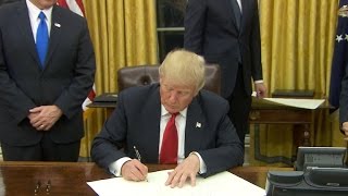 Watch: Trump signs executive orders on first day as President