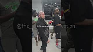 Davido and his foreign bodyguard go shopping in Ghana.