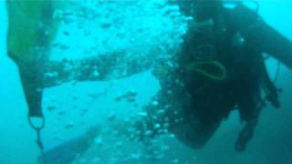 Video: Diving for debris