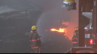 BREAKING - Crews continue to battle massive scrapyard fire in Benwood