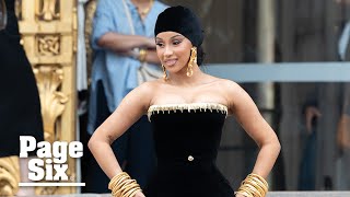 Cardi B delivers drama at Paris Fashion Week in corseted, cloaked couture