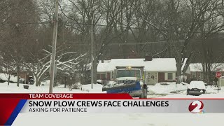 Snow plows working hard to clear roads after intense snowfall