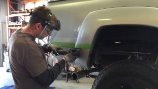 Cutting Toyota Tacoma Bed panel for Bushmaster 2.0 rear bumper by CBI Offroad Fab