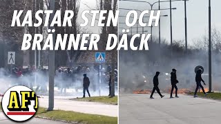 Oroligt i Landskrona – maskerade personer kastar sten och bränner däck: ”Stökigt”
