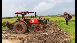 ភ្ជួរនិងរុញដីនៅខេត្តកំពង់ធំស្រុកស្ទោងទាំងមេឃកំពង់ភ្លៀង,Kubota tractor plows in the rain