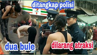 DUA BULE LAGI ASYIK ATRAKSI DITANGKAP POLISI//DI HONGKONG