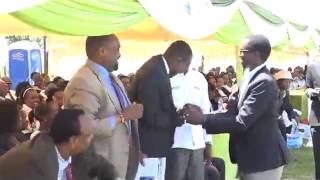 Buzeki meets Mandago at a funeral.