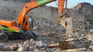 Daewoo 210 Excavator Breaking Rocks For Making stones wall