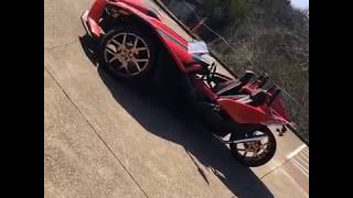 2016 Polaris Slingshot SL sitting on 24” Copper ruccis