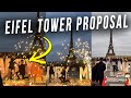 A Proposal in Front of the Eifel Tower With Fireworks and a Big Sign