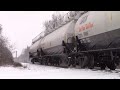 three emd geeps bring loaded gasoline tanktrains on cn train 569 at berry mills nb