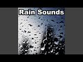 Rain With Distant Thunderstorm
