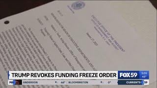 Trump revokes funding freeze order