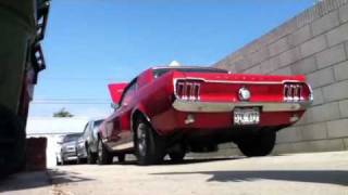 1967 Mustang 302 with a E303 cam. 4 Speed Top loader The Sick 6T7!!