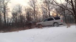 Silva in his 4runner. Snow drift.