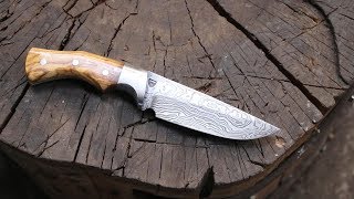 Forging a Damascus hunting knife.