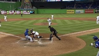 Ozuna gets Nieuwenhuis at dish, ends game