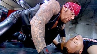 The Undertaker Tombstones The Rock onto a limo: SmackDown, Feb. 7, 2002