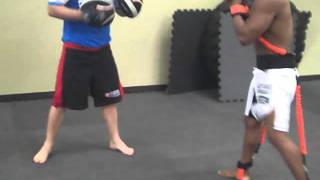 Python Striker Hitting Mits; Jai.AVI