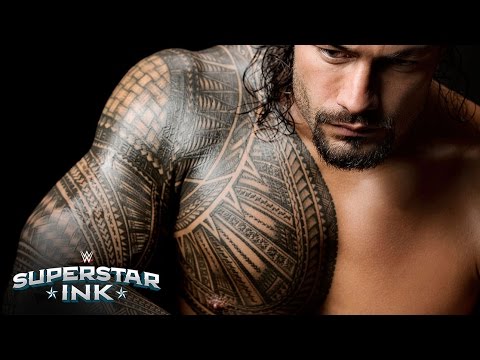 What is the tattoo on Roman Reigns?