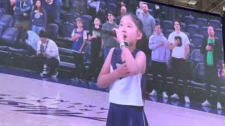 9-year-old Zoe Zhang performs National Anthem for Husky