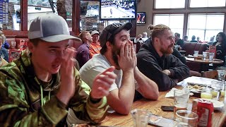 Boise State Fans Watch Broncos in the NCAA Tournament At Local Sports Bar