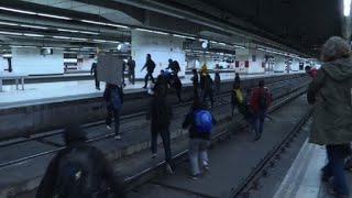 Students occupy train tracks in Barcelona's Sants station