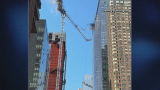 Crane collapses onto street in New York City