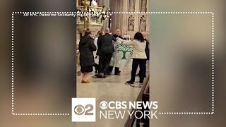 Protesters charged after disrupting Holy Saturday Mass as St. Patrick's Cathedral