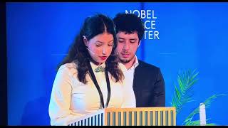 Narges Mohammadi’s children accept the Nobel Peace Prize on her behalf