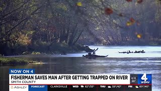 Fisherman saves man after getting trapped on river