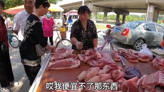 北京房山夏村早市大集，猪肉又便宜了一块钱，看看猪肉卖多少钱？