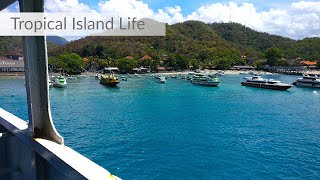 On the ferry from BALI to LOMBOK. | And with the motorbike on the way to Gili Asahan Eco Lodge.