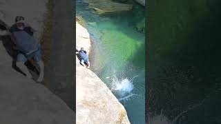 Cliff jumping at Oyster river, BC, Canada