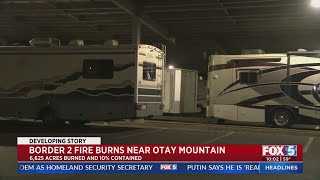 Evacuees wait as crews continue to battle Border 2 fire